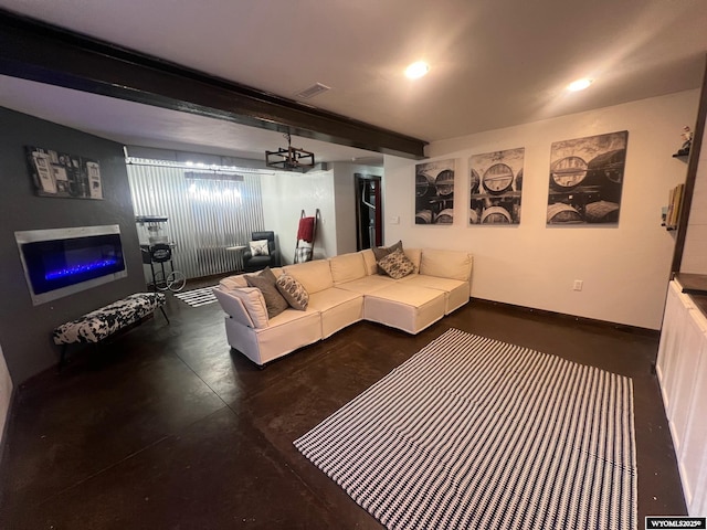 living room featuring beam ceiling, concrete floors, visible vents, and baseboards