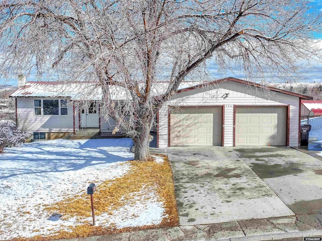 single story home with a garage