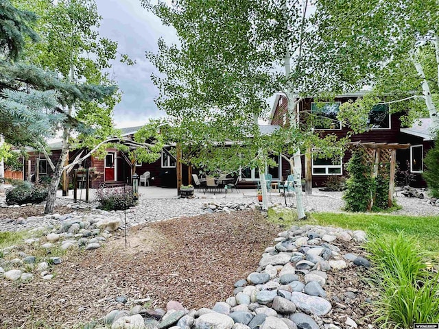 view of front of house with a patio