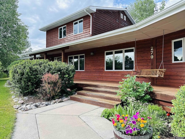 entrance to property with a porch