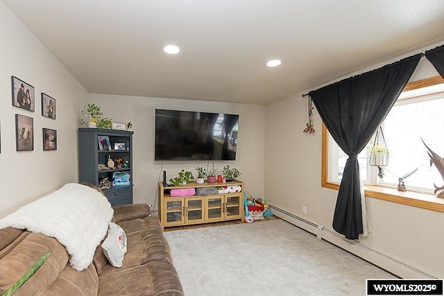 living area featuring carpet floors, baseboard heating, and recessed lighting