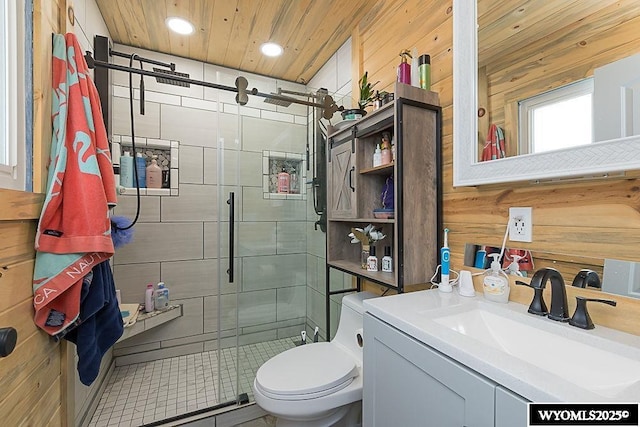 full bath with toilet, wood walls, a stall shower, and wood ceiling