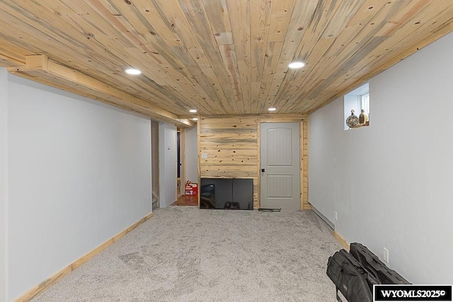 basement with baseboards, carpet, wooden ceiling, and recessed lighting