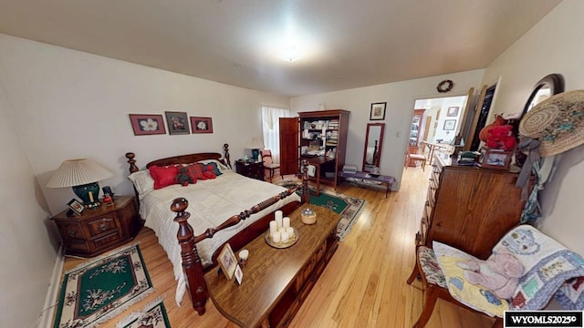 bedroom featuring light wood-style flooring