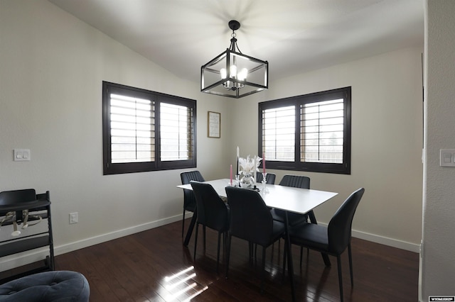 dining area featuring a healthy amount of sunlight, baseboards, and dark wood-type flooring