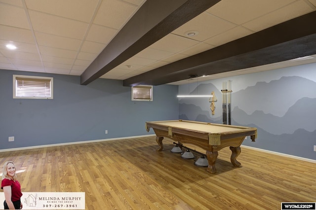 recreation room with billiards, baseboards, beamed ceiling, wood finished floors, and a paneled ceiling