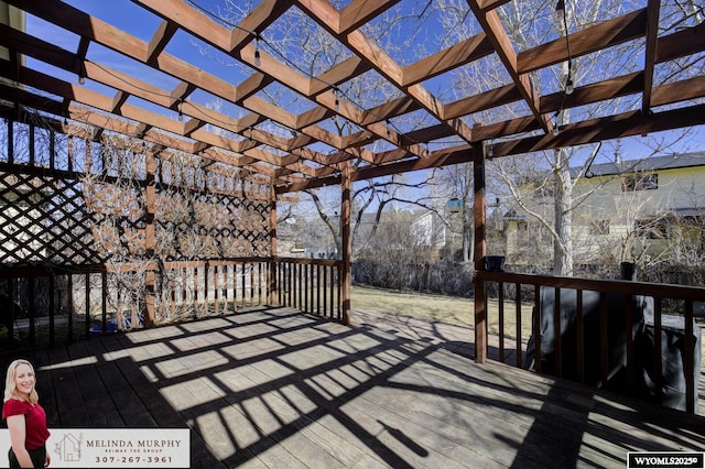 wooden terrace featuring a pergola