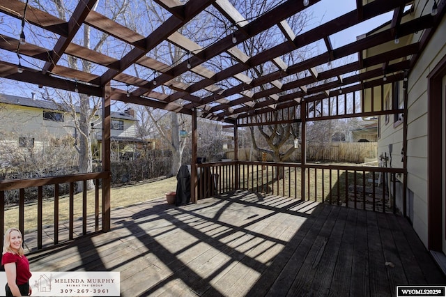 wooden terrace with a pergola