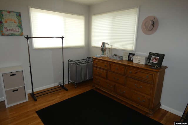 interior space with light wood-style floors and baseboards