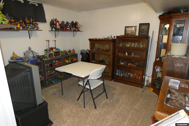 home office with ornamental molding and carpet flooring