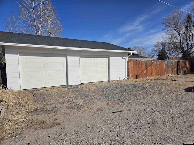 detached garage with fence