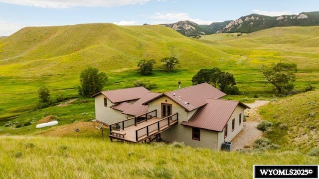 birds eye view of property featuring a rural view and a mountain view