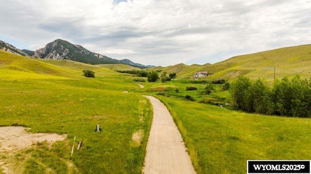 view of property's community featuring a rural view and a mountain view