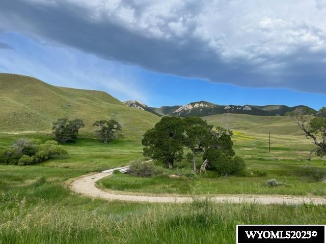 view of property's community featuring a mountain view and a rural view