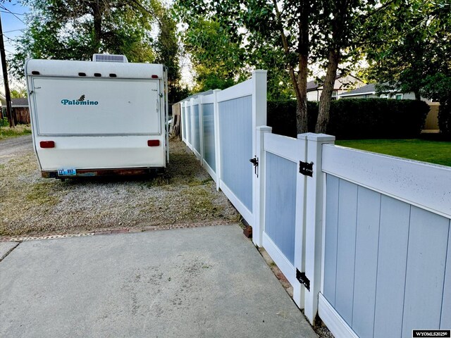 exterior space with a gate and fence