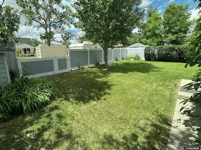 view of yard featuring a fenced backyard