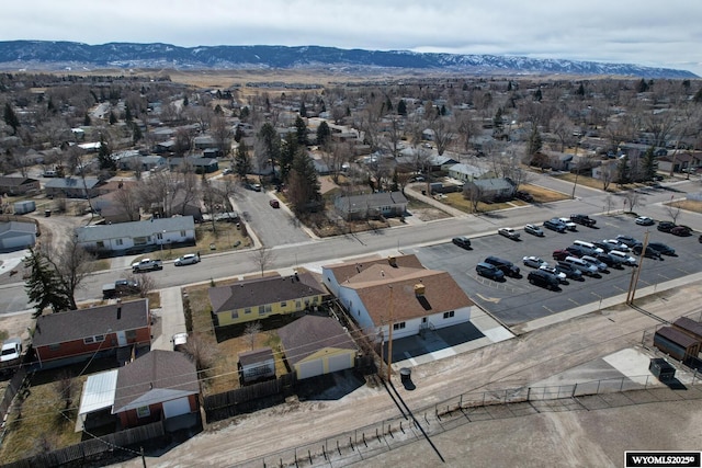 birds eye view of property featuring a residential view and a mountain view