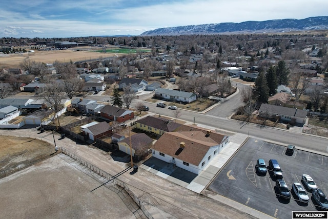 birds eye view of property with a residential view and a mountain view