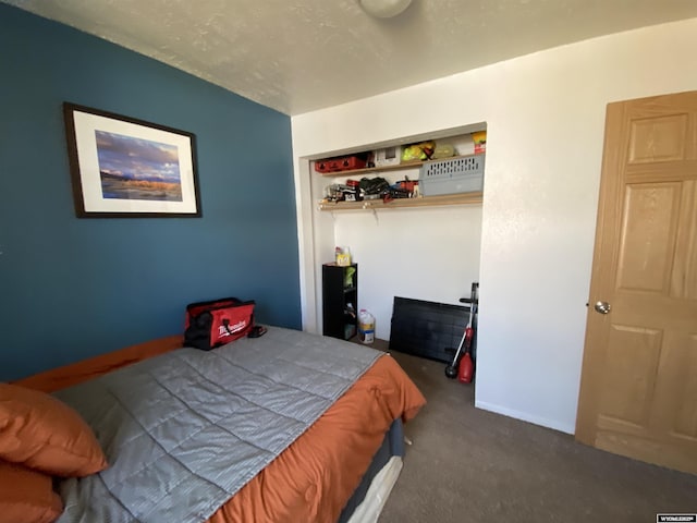 carpeted bedroom with baseboards