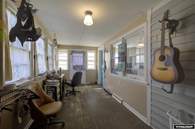 office space with wood-type flooring and baseboards