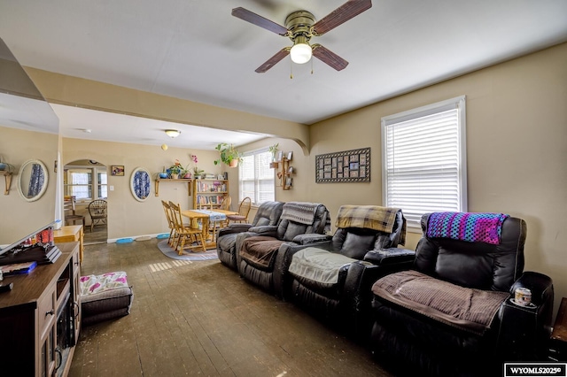 living area featuring ceiling fan and hardwood / wood-style flooring