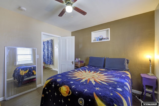 bedroom with ceiling fan and baseboards