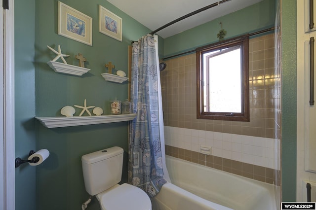 full bathroom with toilet and shower / bath combo with shower curtain