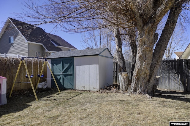 view of shed featuring a fenced backyard