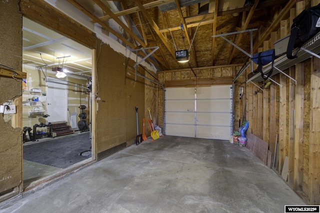 garage featuring a garage door opener