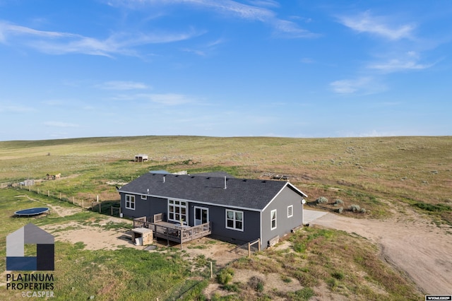 birds eye view of property featuring a rural view