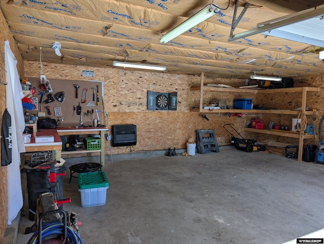 garage featuring a workshop area