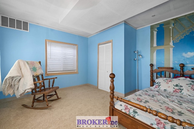 carpeted bedroom with visible vents, baseboards, and a closet