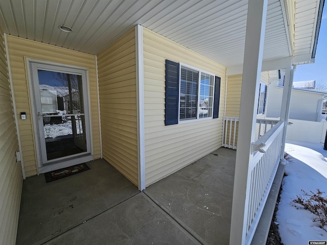 property entrance featuring covered porch