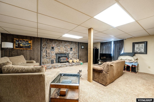 living room with carpet flooring and a drop ceiling