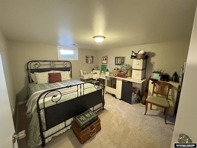 bedroom with light carpet