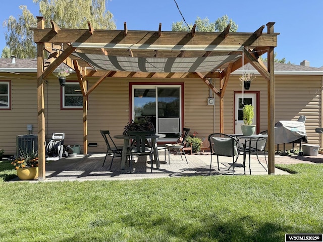 rear view of house with a patio area, central AC unit, a lawn, and a pergola