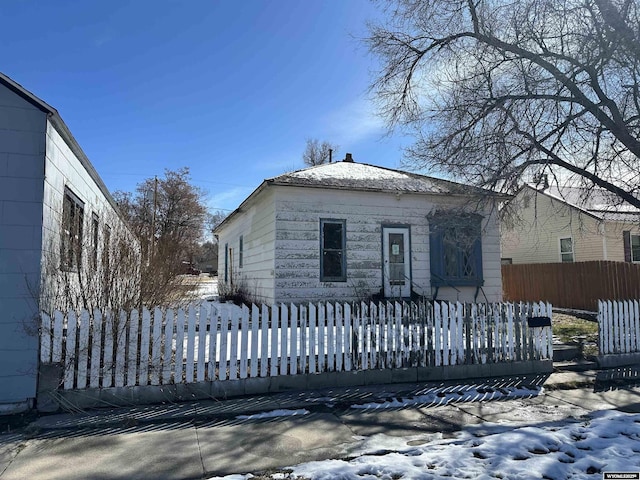 view of front of home with fence