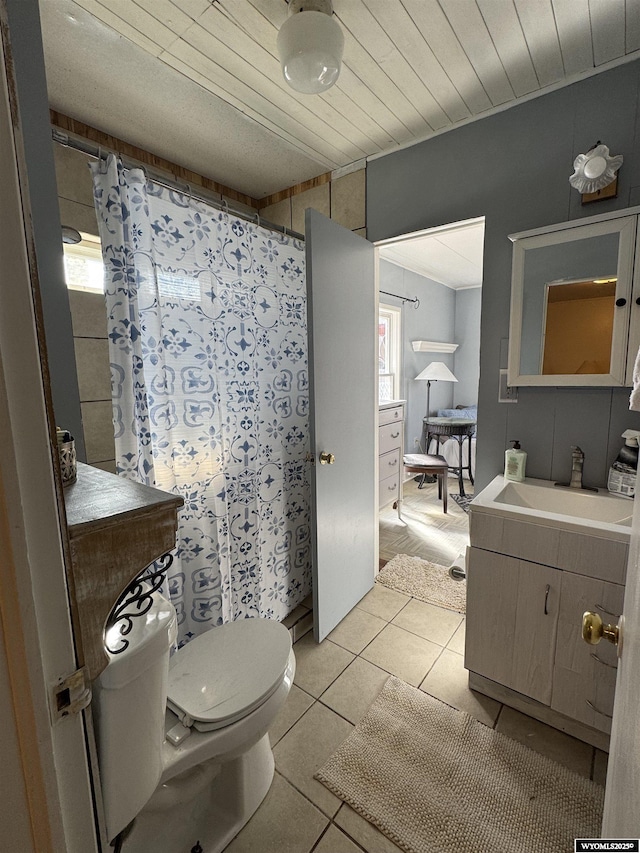 bathroom featuring vanity, curtained shower, tile patterned floors, toilet, and wooden ceiling