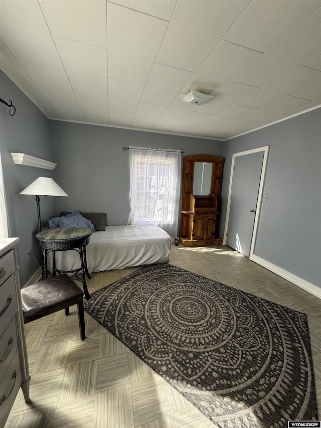 bedroom featuring baseboards