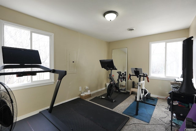 workout area with visible vents and baseboards