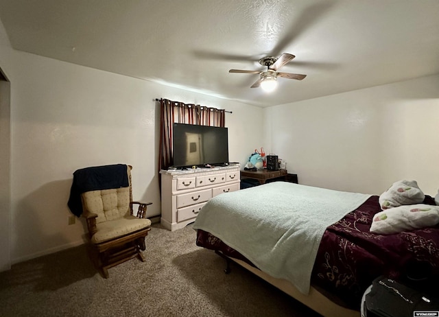 bedroom with baseboards, carpet, and ceiling fan