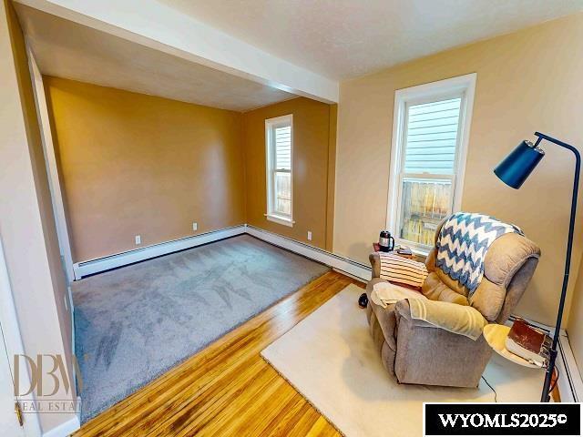 sitting room with wood finished floors