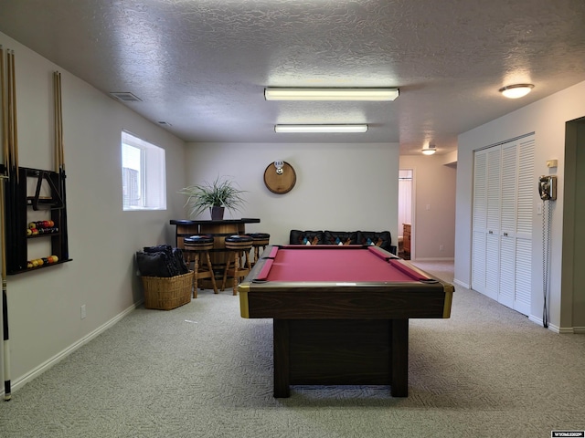 game room with visible vents, a textured ceiling, carpet, pool table, and baseboards