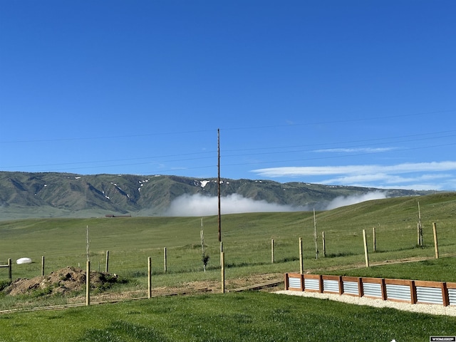 view of mountain feature with a rural view