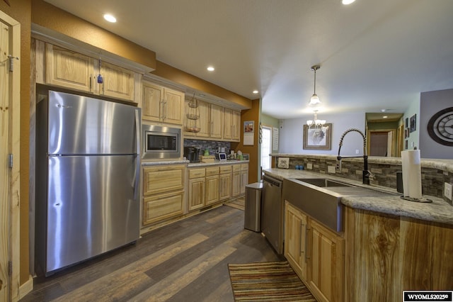 kitchen featuring light brown cabinets, backsplash, dark wood-style floors, recessed lighting, and stainless steel appliances