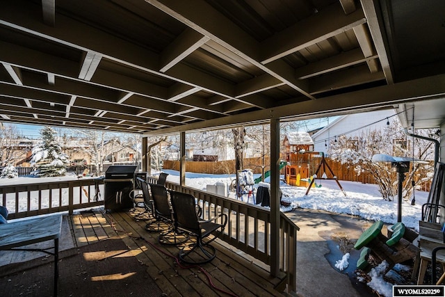 view of snow covered deck