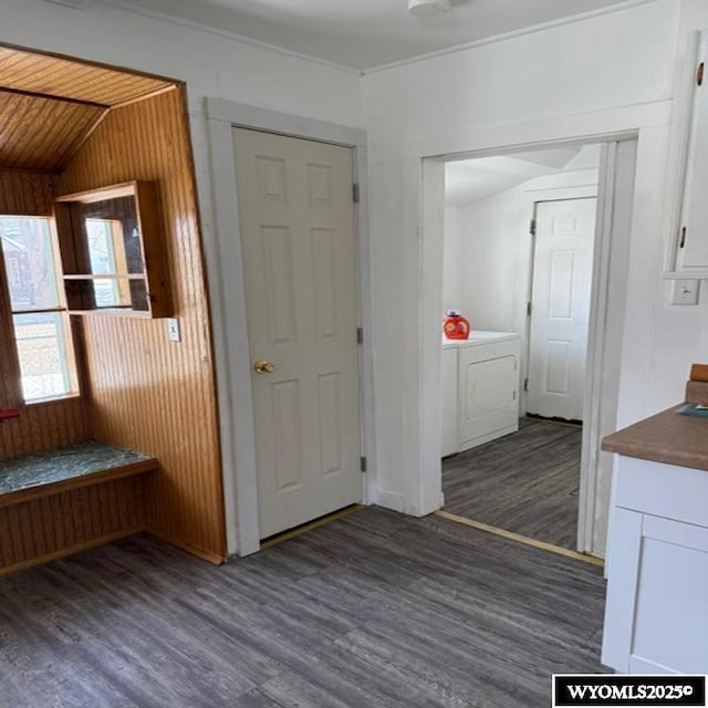 hall featuring washer / clothes dryer and wood finished floors