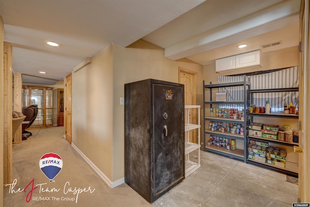 interior space featuring recessed lighting, visible vents, baseboards, and concrete floors