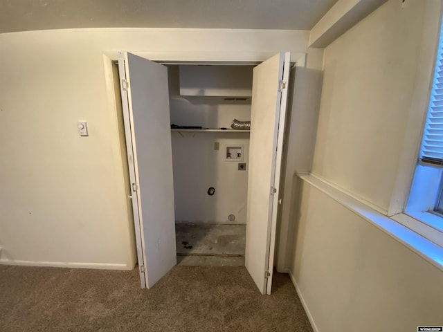 washroom featuring laundry area, carpet flooring, baseboards, and washer hookup