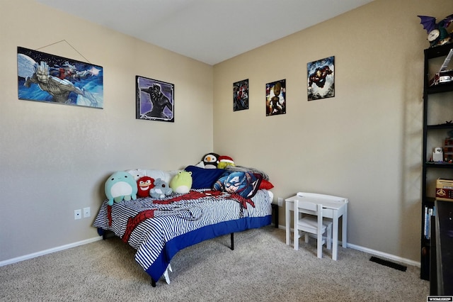 bedroom featuring visible vents, baseboards, and carpet flooring